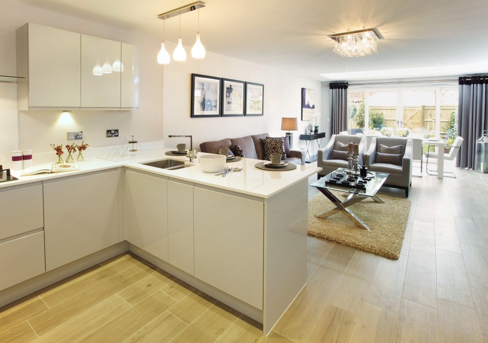 Oakford Homes, a view of the kitchen and living room magazine for builders