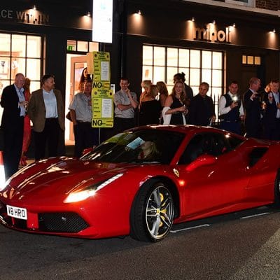 A Ferrari in front of the London Showroom Supercars 2016